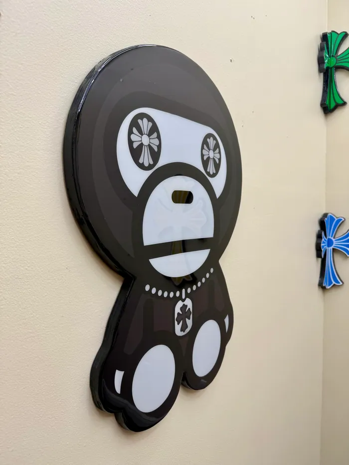 The cross-eyed ape piece seen from the side, showing the depth of the epoxy